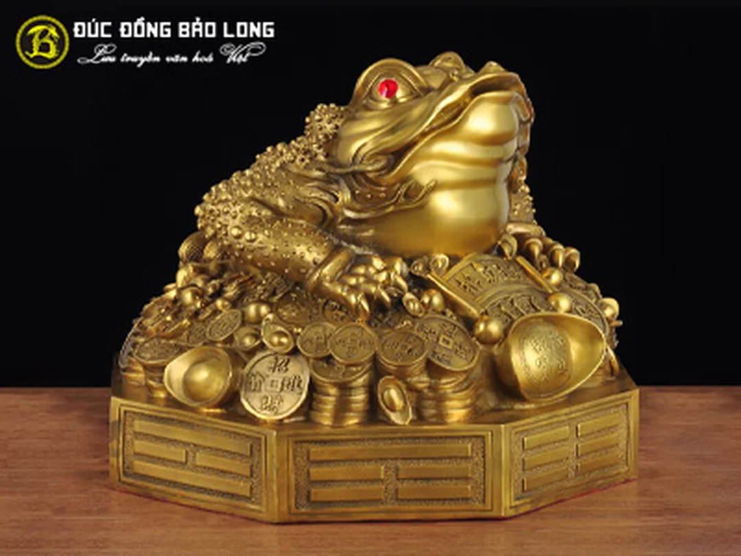 con cóc ba chân bằng đồng đặt trên đế bát quái