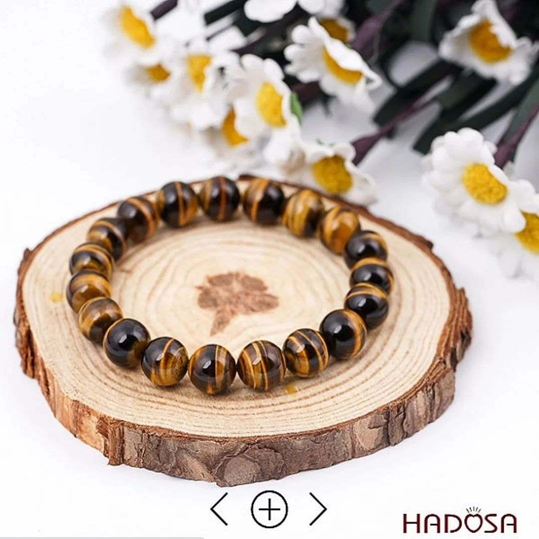 đá mắt hổ vàng nâu ánh lụa khi chiếu sáng