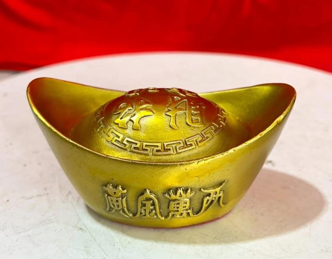 Thỏi vàng biểu tượng tài lộc trong phòng khách vật phẩm phong thủy phòng khách với thỏi vàng tài lộc