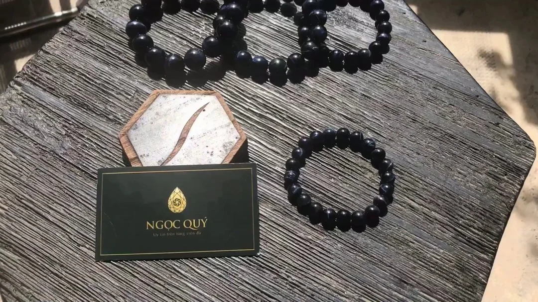 Video vòng thạch anh mắt hổ xanh đen 8mm