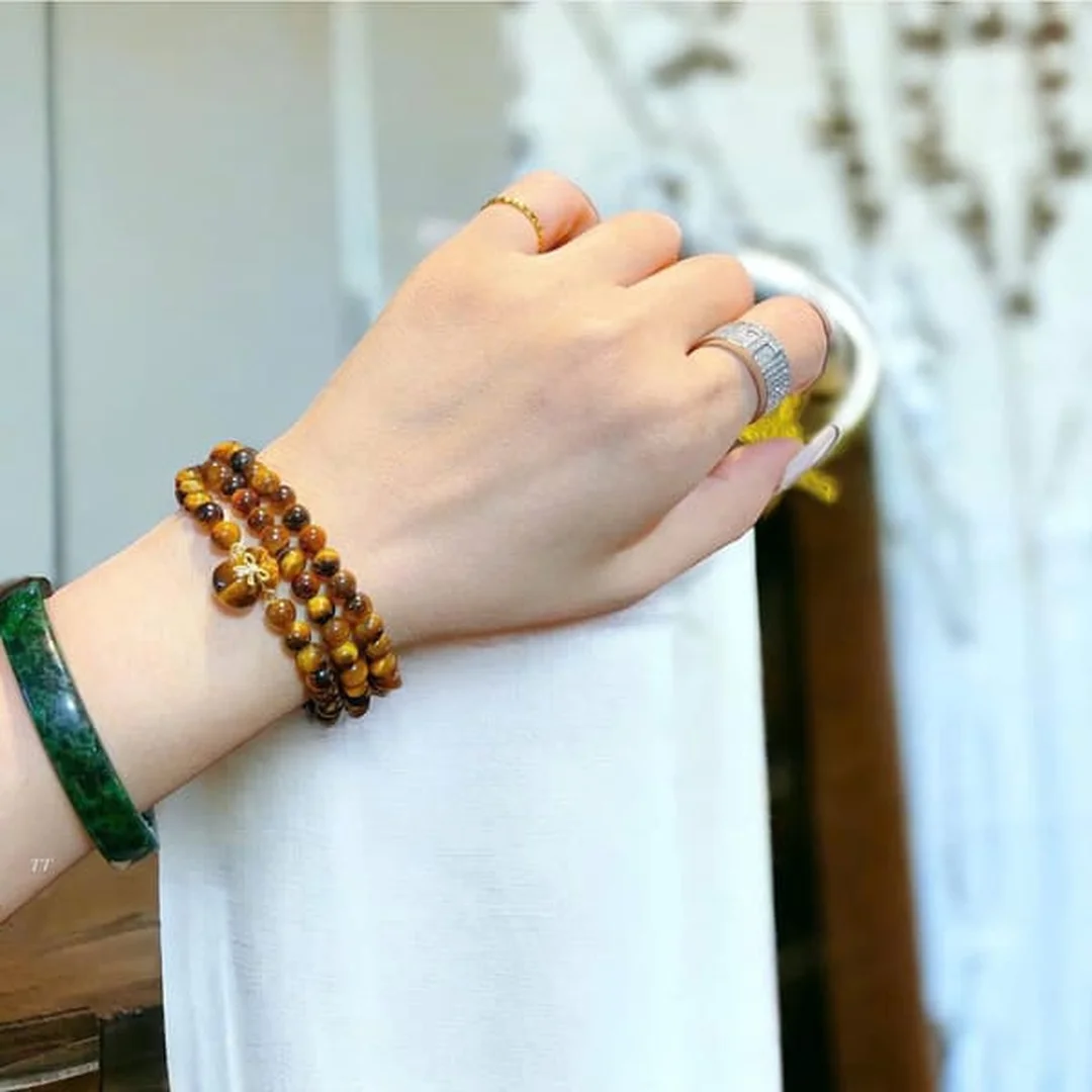 vòng tay đá mắt hổ vàng nâu hợp mệnh gì khi chọn size hạt