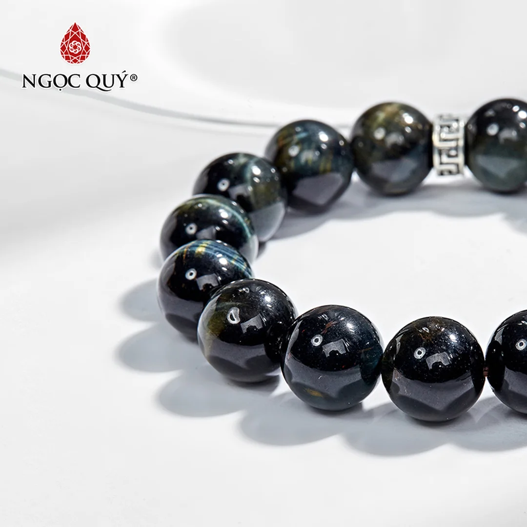 vòng tay thạch anh mắt hổ xanh đen phối charm phong thủy